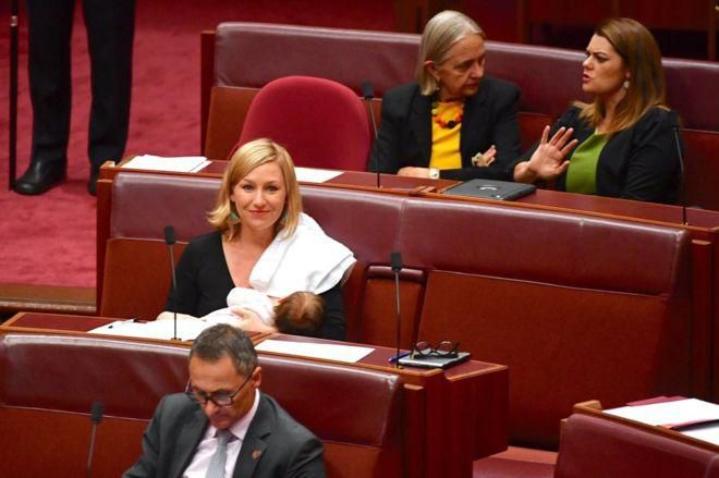 Australian Senator Larissa Waters with her baby in Parliament