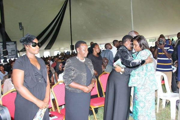 Governor Joyce Laboso (right) condoles with Bomet East MP Beatrice Kones during the burial of Collins Kipyegon Kalya