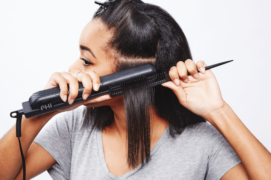 Flat ironing hair gif