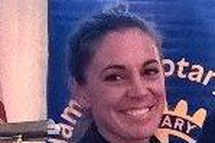 Police officer hired hit man to kill her husband and a young girl, officials say