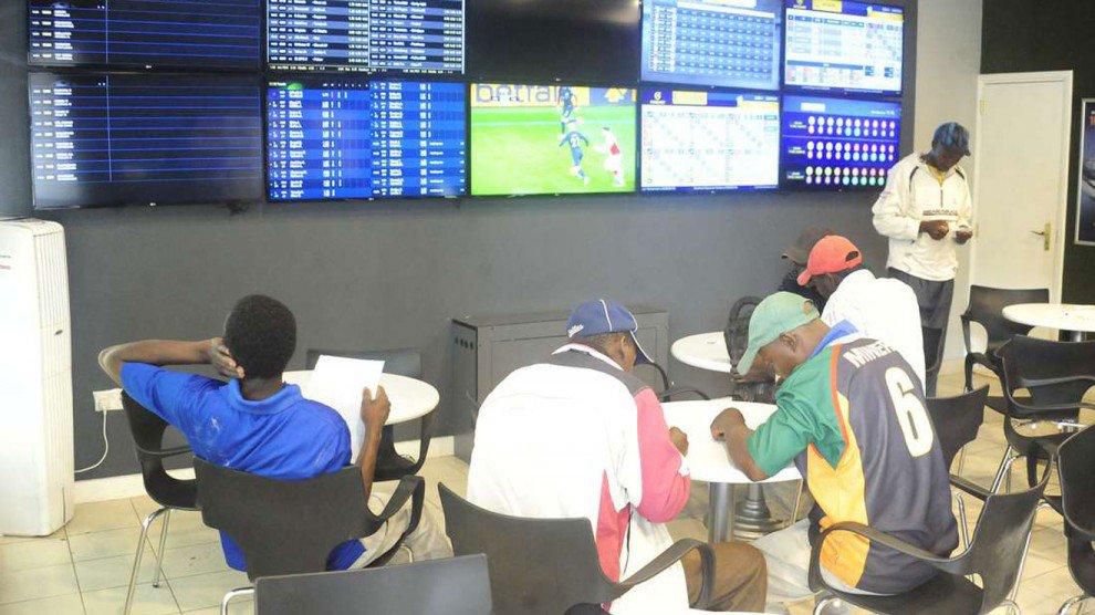 Gamblers in a betting shop in Kenya