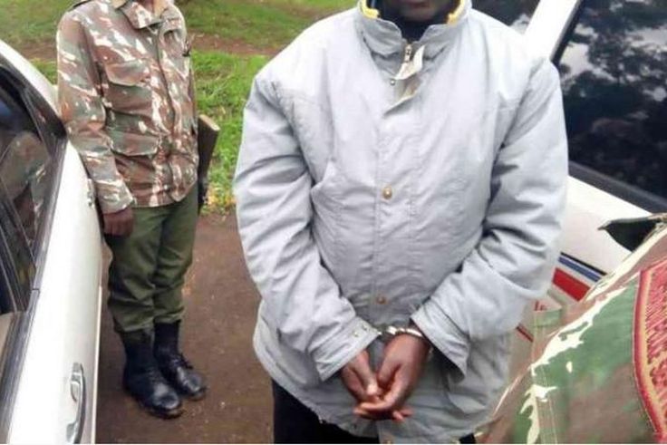 File image of a suspect during a past arrest