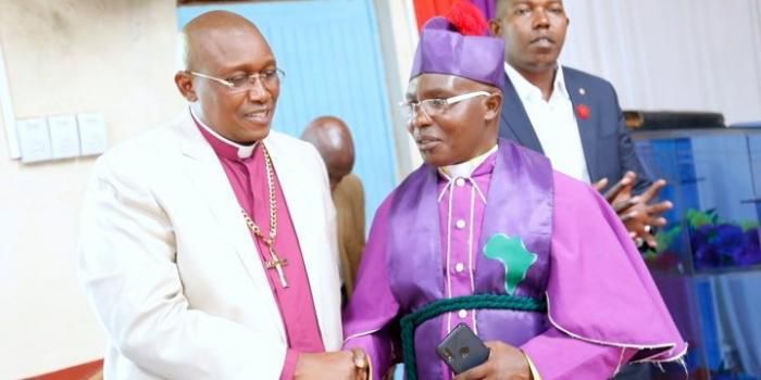 File image of Bishop David Ngari with Peter Kigoi at AIPCA Karure in Gatundu North