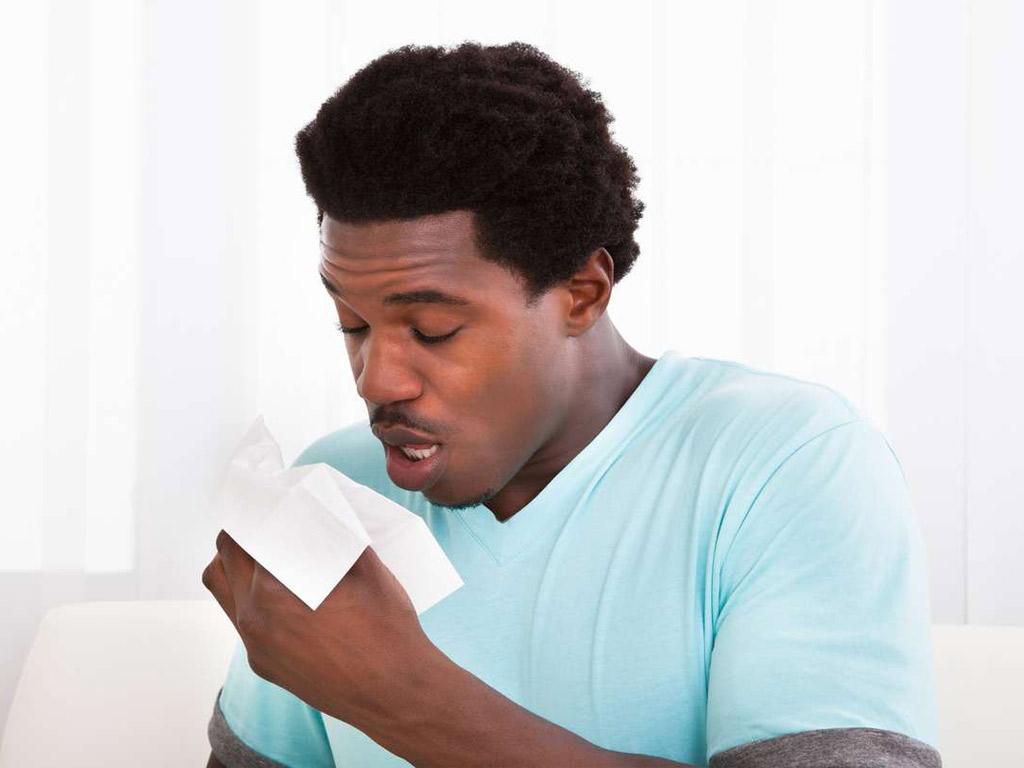 Sick man coughing(nation)