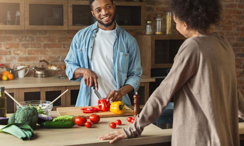 African American Couple Cooking.