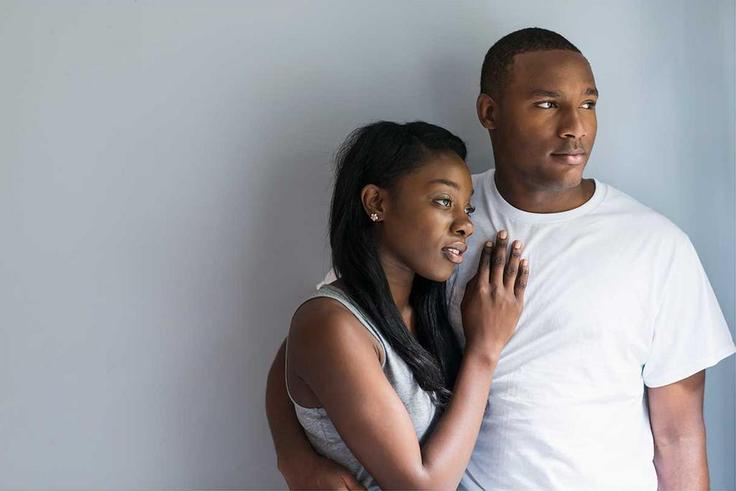 A man and woman embrace each other [Source: Essence]
