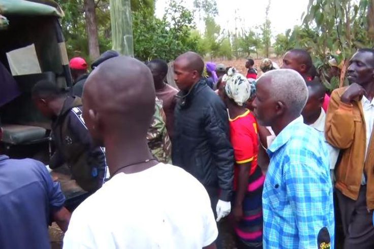 File image of police officers ferrying the body of a woman who was killed by her lover