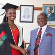 Miss Uganda Queen Abenakyo shaking hands with Makerere Universit Vice Chancellor Nawawgwe