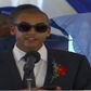 Andrew Kenneth lights up mourners at his grandmother, Rahab Muhuni's burial in Kirwara Gatundu