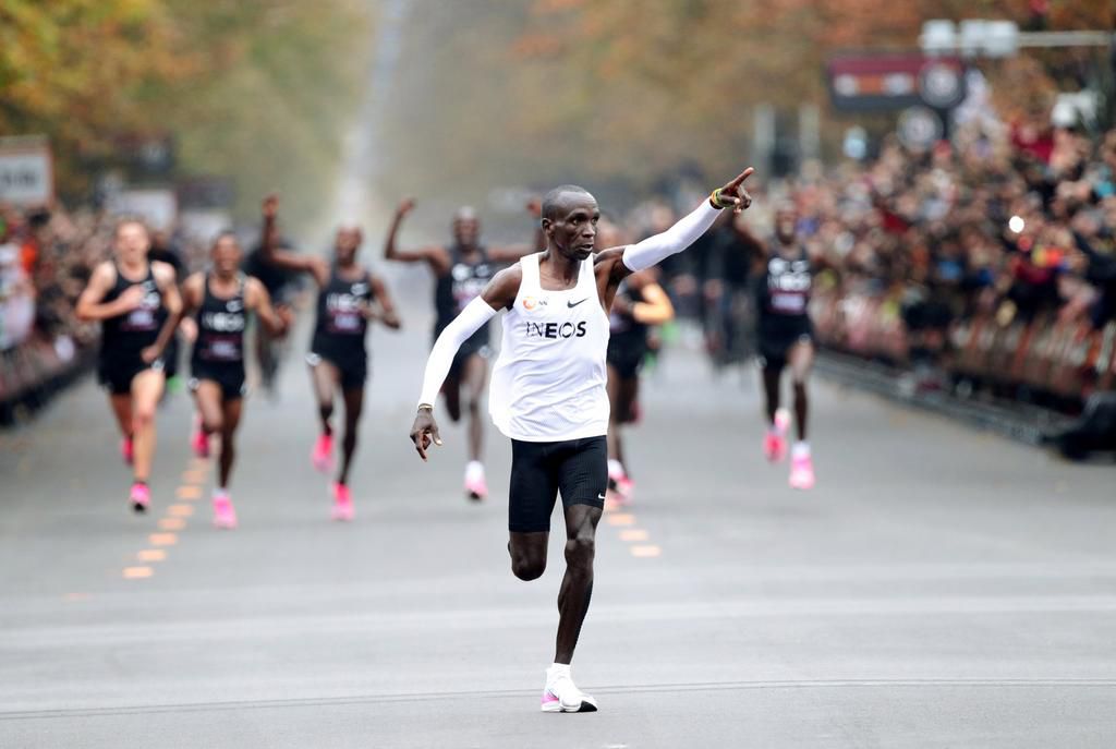 Kenya's Eliud Kipchoge is first to run marathon in less than 2 hours