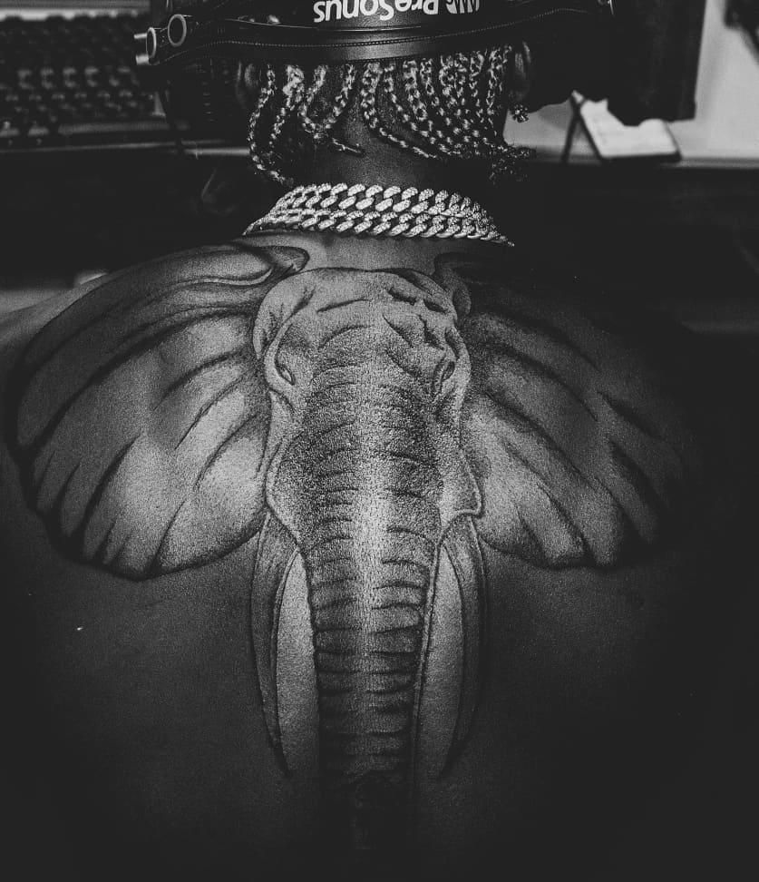 Harmonize gets huge elephant tattoo on his back and fans can’t keep calm (Photos)