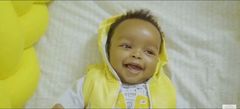 Kabi and Milly WaJesus reveal their son's face for the first time (Courtesy/YouTube)