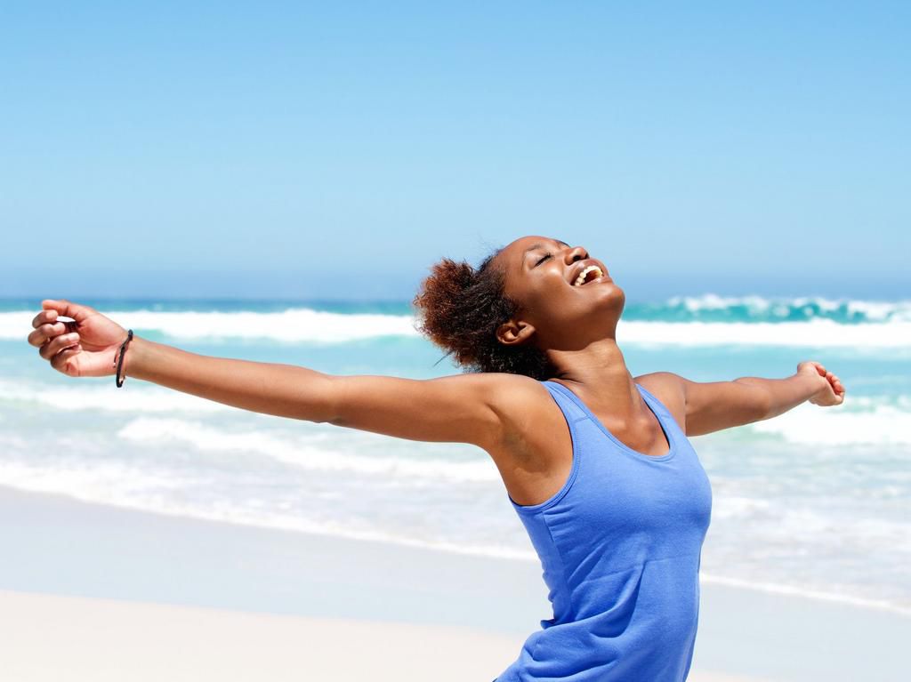 Beach happy woman smiling