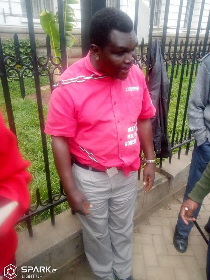 The man chained outside City Hall