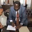 AU envoy Raila Odinga with Wendy Waeni at his office