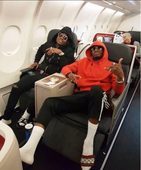 Diamond Platnumz with Harmonize in a plane