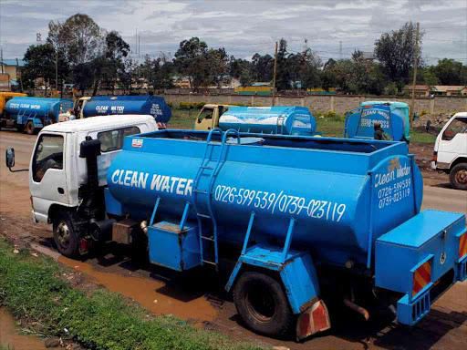 A water bowser delivers water in the city centre