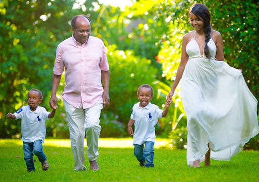Reginald Mengi, wife and twin sons