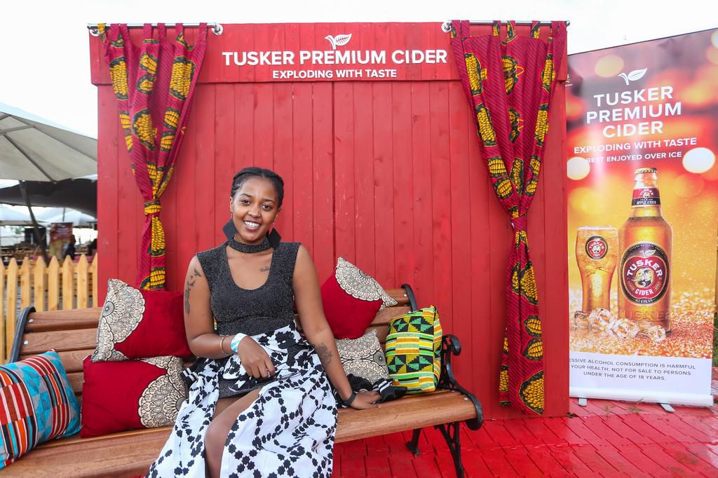 Miss Kellen matildah poses for a photo at Tusker cider tent during the Bomas of Kenya