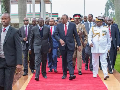 File image of a delegation receiving President Uhuru Kenyatta from a foreign trip