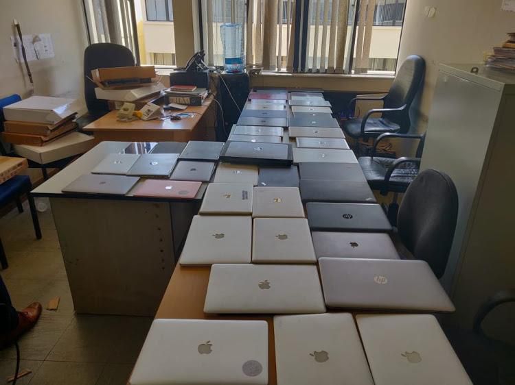 File image of stolen laptops recovered in Nairobi during a previous raid by police