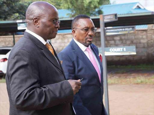 Lawyer Assa Nyakundi arrives at a Limuru court with his client, Neno Evangelism Centre Pastor James Nganga