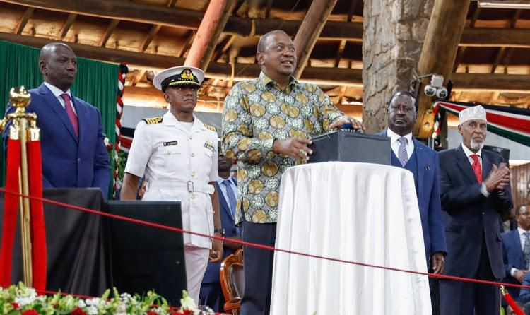 President Uhuru Kenyatta, DP William Ruto and Opposition leader Raila Odinga at BBI report launch