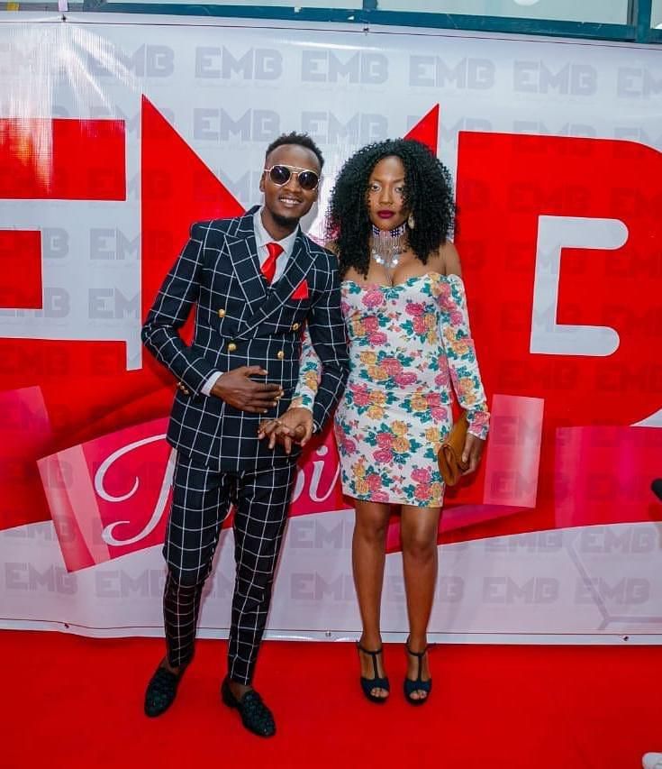 Celebrities at the EMB Rebirth Party . Bahati signs Dany Gift