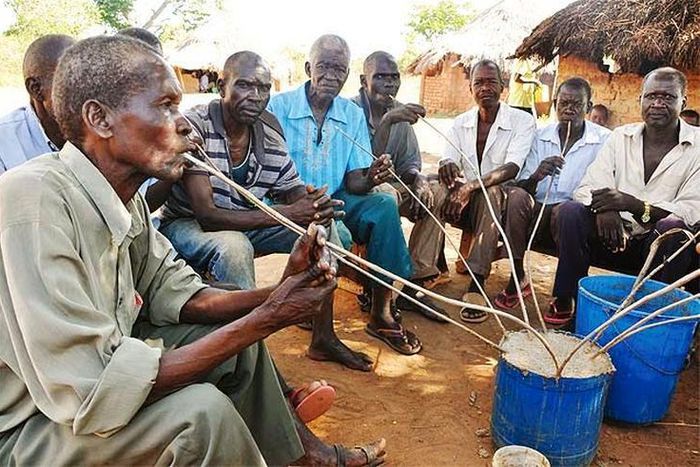 Locals enjoying pot of Ajon in one of the drinking joints