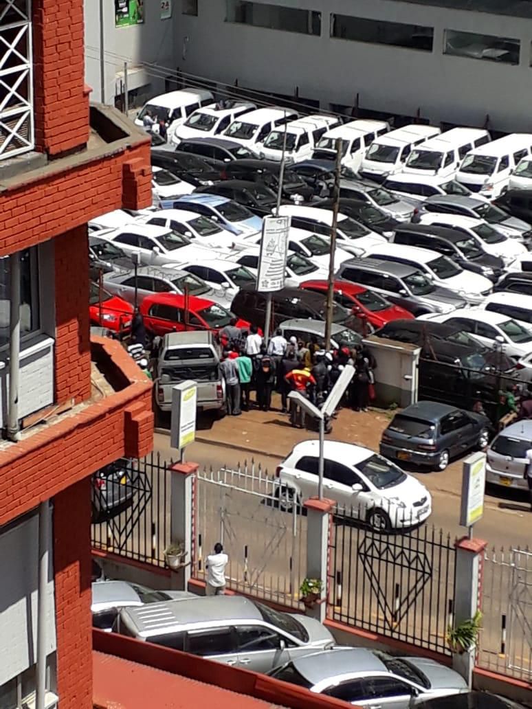 Crowd at the scene outside Diamond Plaza