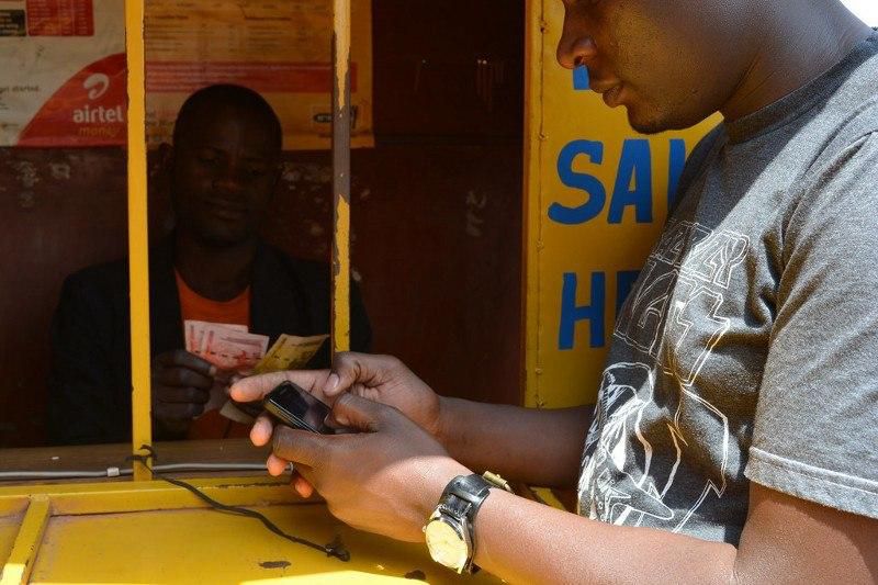 A customer at one of the mobile money centre