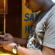 A customer at one of the mobile money centre