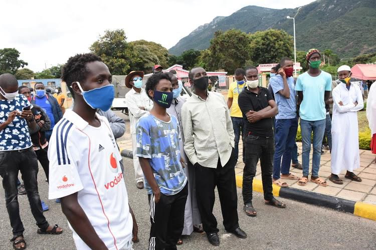 A group of drivers waiting at the namanga border point