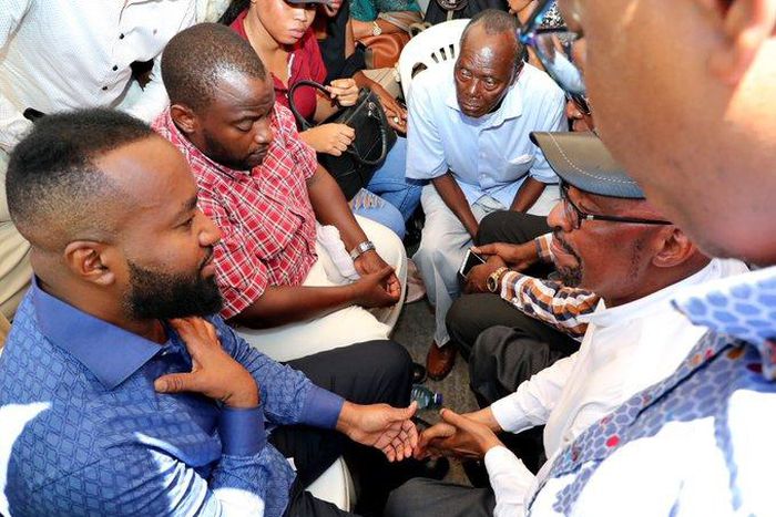 Governor Hassan Joho with the family of Likoni tragedy victims