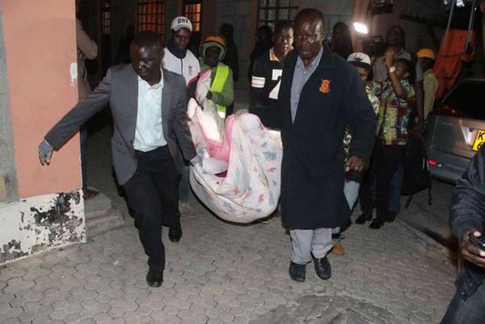 A file photo of a body being taken to the mortuary