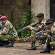 Kenyan police officers during a past stake out (Twitter)