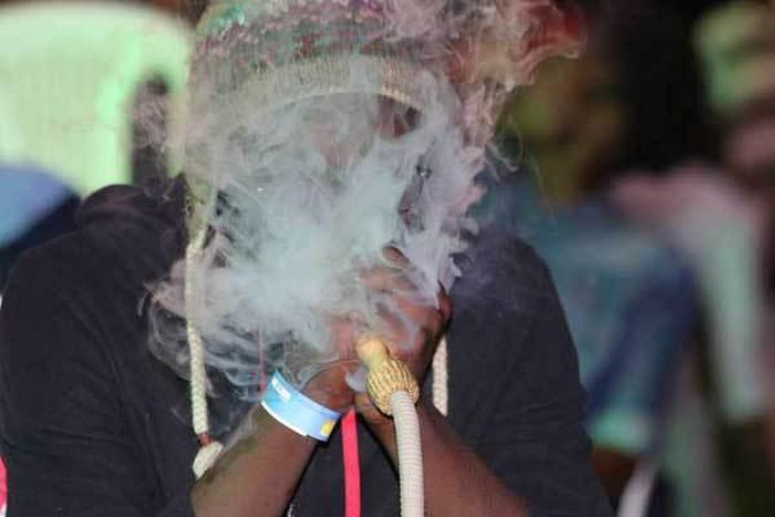 A man smoking Shisha