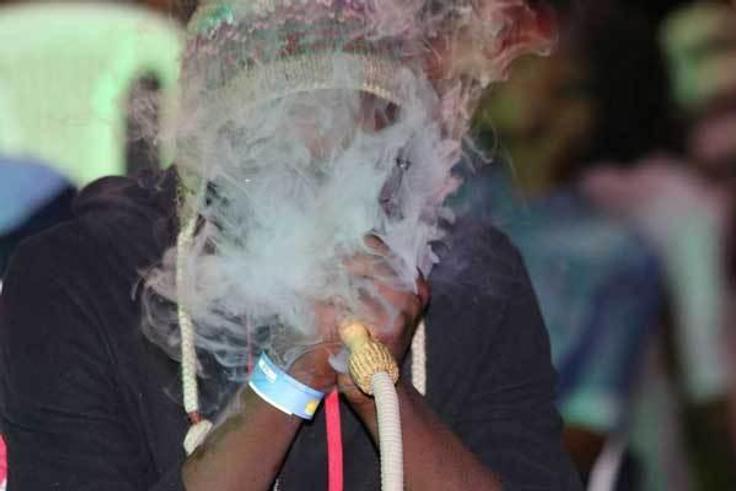 A man smoking Shisha