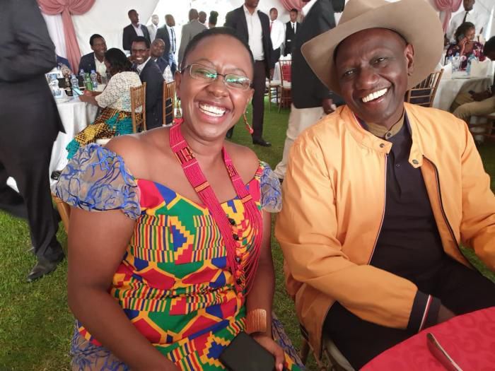 Sabina Chege and DP Ruto pose for a photo at the wedding