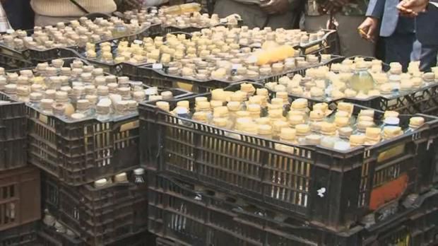 Police impounding illicit brew