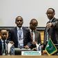 African Union chairperson and Rwanda's President Paul Kagame (R) gestures at the beginning of an African Union High Level Consultation Meeting with African leaders regarding the DR Congo election