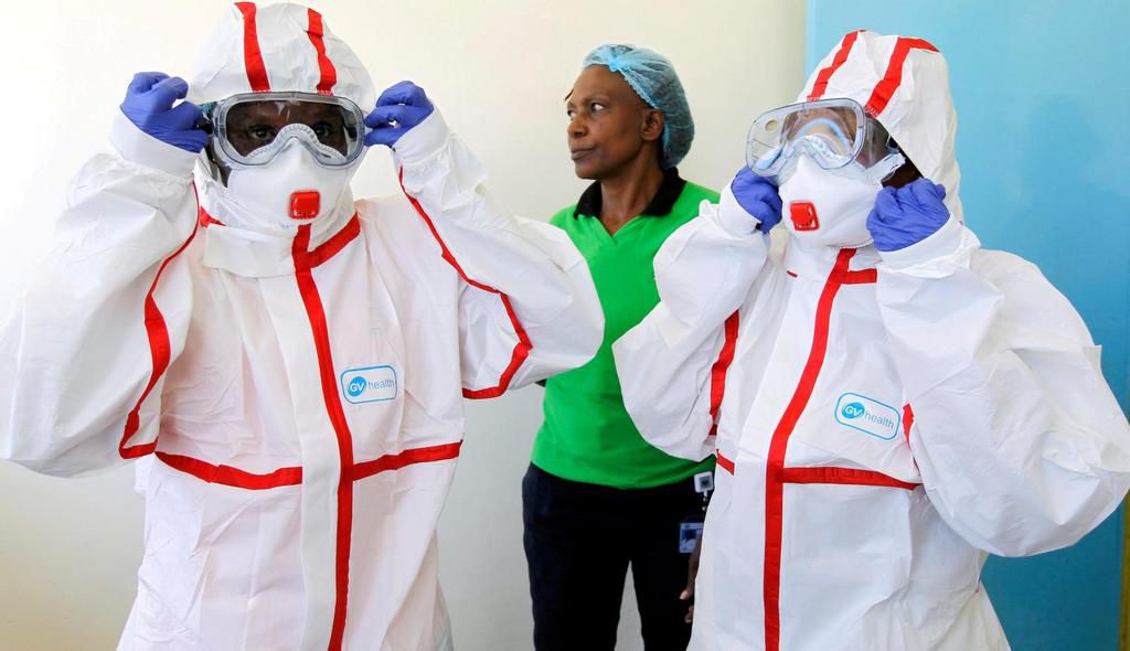 Kenyan medics during a demonstration of preparations for any potential coronavirus cases at the Mbagathi Hospital, isolation centre for the disease, in Nairobi