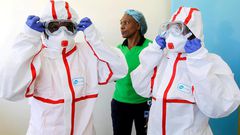 Kenyan medics during a demonstration of preparations for any potential coronavirus cases at the Mbagathi Hospital, isolation centre for the disease, in Nairobi