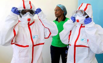 Kenyan medics during a demonstration of preparations for any potential coronavirus cases at the Mbagathi Hospital, isolation centre for the disease, in Nairobi