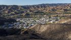 With Whipping Winds and Power Down, Californians Flee Fires