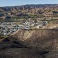 With Whipping Winds and Power Down, Californians Flee Fires