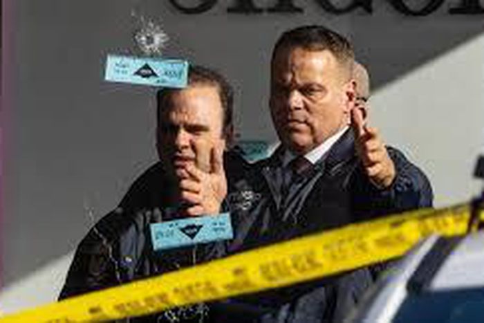 Within minutes, the first police officers arrived, and two officers and a sergeant ran inside, officials said.