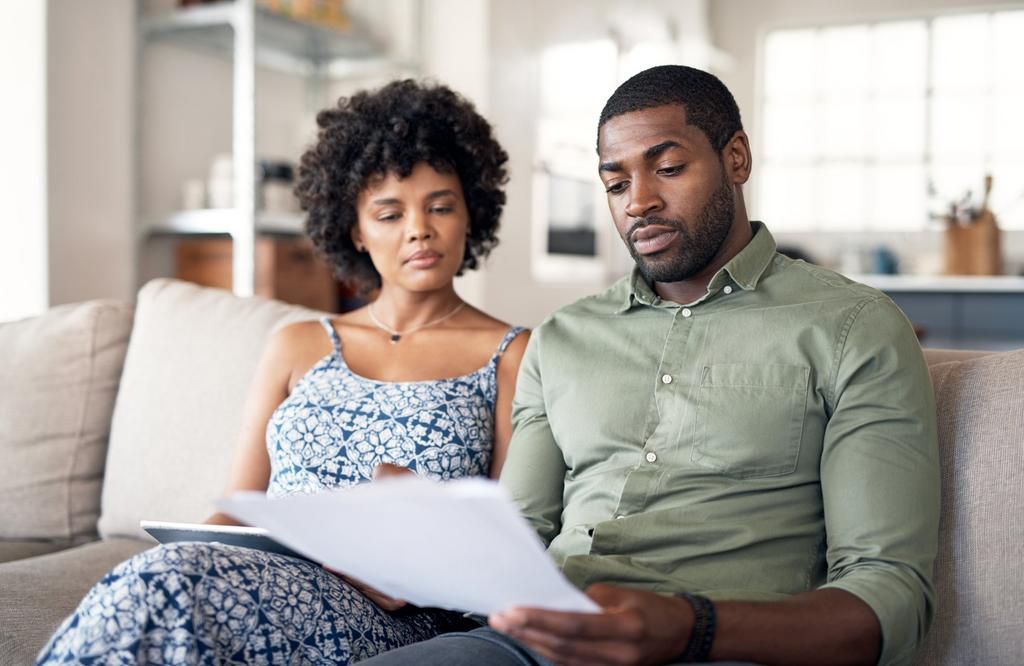 couple looking at bills