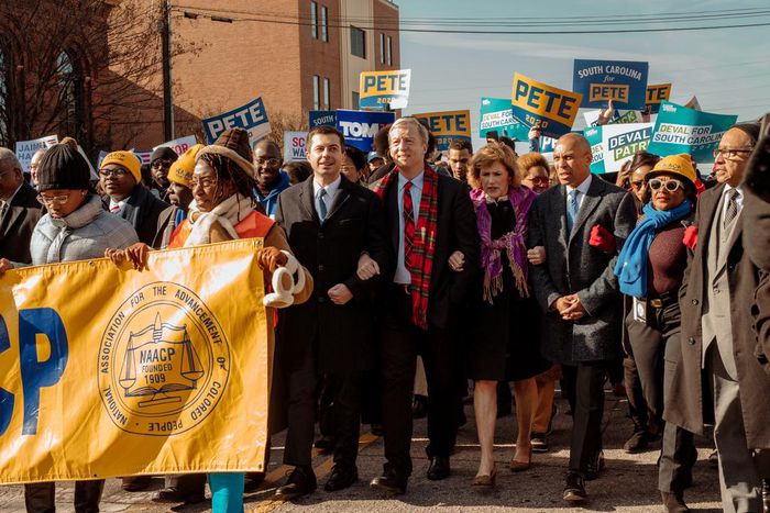 On King Holiday, 2020 Democrats March Arm in Arm to Honor His Legacy