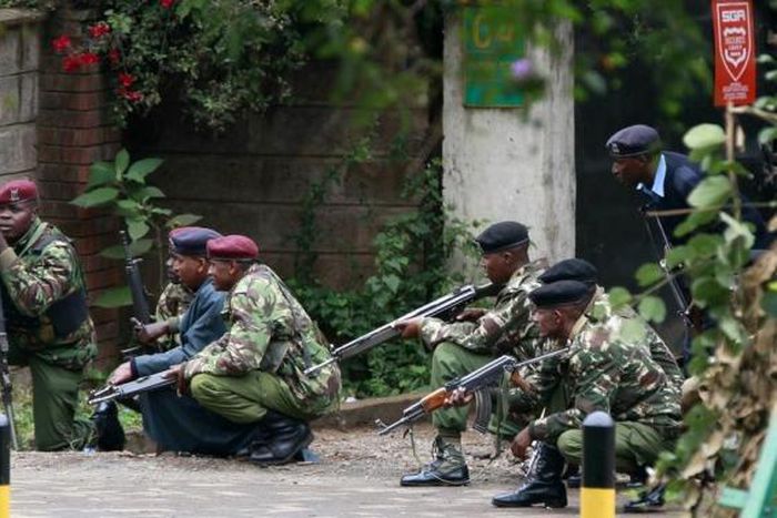 File image of police officers at work. 3 police officers from Kayole police station were arrested after stealing Ksh.6 million in dramatic robbery